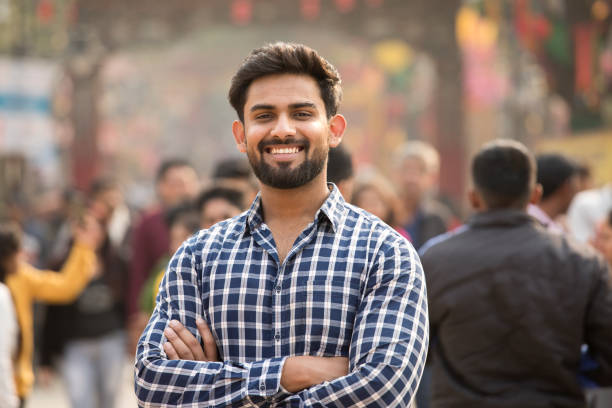 Happy Indian man at street market Happy Indian man at street market